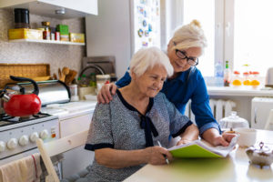 Mother helps her elderly mother deal with legal matters after dementia diagnosis