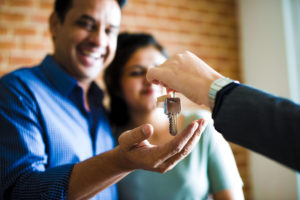 Married couple receives keys to their new home